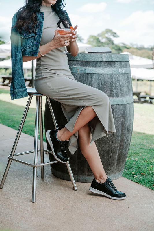 Lifestyle image for Boston Zip Sneaker - Black Perf